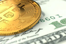 Single Bitcoin laid on U.S. one hundred dollar bill