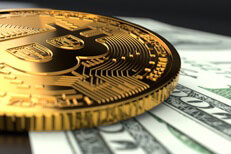Single Bitcoin close-up photo laying on U.S. currency