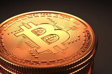 Alternate camera position on stack of Bitcoins with dark background