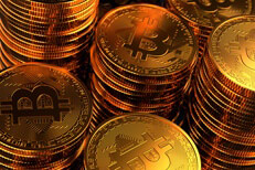 Top view on multiple stacks of Bitcoin with cast golden lighting