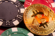 Gold bitcoin on pile of poker chips cryptocurrency risk concept