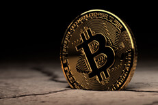 Bitcoin stuck in cracked dry desert mud