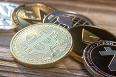 Bitcoin in front of curved row of altcoins Bitcoin in front of row including Zcash, Ethereum, Ripple, Monero, and Litecoin