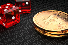 Small stack of Bitcoins with two dice representing Bitcoin investment risk or cryptocurrency risk