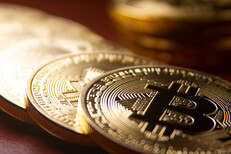 Bitcoin row with short depth of field Bitcoins arranged in a row with single coin in background with short depth of field