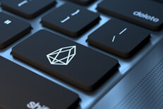 Laptop keyboard with EOS cryptocurrency key