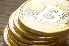 Close view of leaning stack of bitcoins Close up view from top of leaning stack of bitcoins