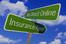 Street sign with opposite arrows pointing to Buy Direct Online or Insurance Agent