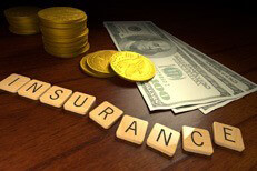 Free image illustrating high cost of car insurance with money and gold coins