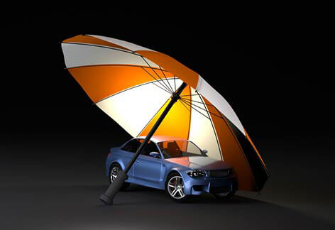 Auto insurance protection concept Car insurance protection concept of blue car under orange and white umbrella with dark background