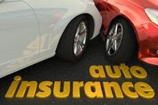 Side impact collision auto insurance concept Two car collision showing damage and auto insurance words in foreground