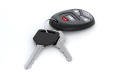 Car keys and key fob isolated on white