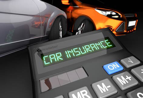 Two car accident in background with calculator LCD showing Car Insurance in foreground