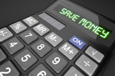 Calculator on dark background with LCD text reading Save Money
