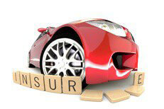 Fish eye view of red sports car knocking over wood insurance letters on white background