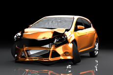 Orange car front end collision damage Photo of orange car after front end collision damage accident