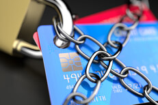 Chained credit cards Credit cards locked to padlock and wrapped in chains concept for credit protection