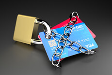 Credit cards padlocked and chained Two credit cards padlocked and chained concept for credit lock or secure credit