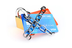 Padlocked and chained credit cards Credit cards with padlock and chains isolated on white