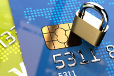 Two credit cards with small padlock Blue and green credit cards stacked with small padlock
