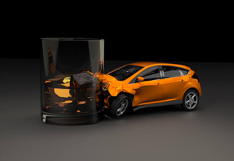 Orange car crashed into whiskey glass Car crashed into side of whiskey glass concept for drinking and driving