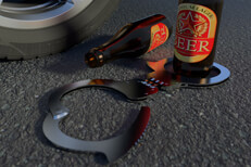 DUI arrest on road Beer bottles with handcuffs on street next to car tire and wheel DUI arrest concept photo
