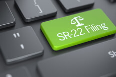 Dark keyboard with large green SR-22 Filing key concept for finding SR-22 car insurance online