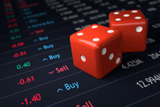 Dice on stock ticker Red dice on stock ticker chart showing stock prices and buy/sell recommendations