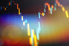 Stock prices with flare Closeup of candlestick stock price chart with lens flare and overlay