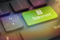 Retirement key with flare Laptop keyboard with large green Retirement key and calculator icon with lens flare and overlay