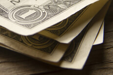 Angled view of dollar bills Free money photo of stack of one dollar bills close up of corner