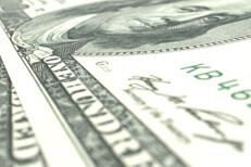 Free image of 100 dollar bill close up at angle and shallow depth of field