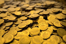 Large pile of gold coins concept for wealth, investment, large returns, or rich