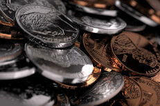 Coin pile closeup Close-up picture of U.S. coins randomly piled on surface