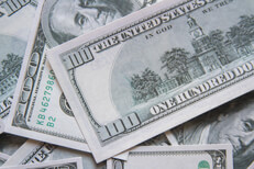 Top view of scattered $100 bills Top view of scattered $100 bills showing fronts and backs