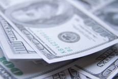 Sloppy stack of $100 bills Sloppy stack of $100 bills with depth of field blur