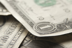 Corner view of dollar bills Full frame photo of random pile of dollar bills