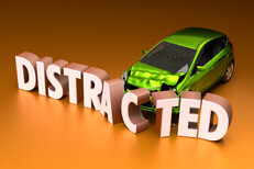 Green compact car crashed into displaced DISTRACTED letters concept for distracted driving