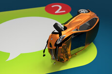 Small car with rollover damage from being distracted with large messenger app icon underneath
